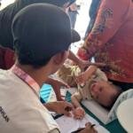 Sinergi KKN Unmuh Jember dan UAD Dampingi Posyandu Bulanan di Desa Sumberasri