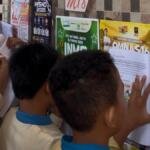 Dari Soal Buku Paket ke Praktik Nyata: Siswa Kelas 6 SDM 18 Surabaya Dalami Isi Poster